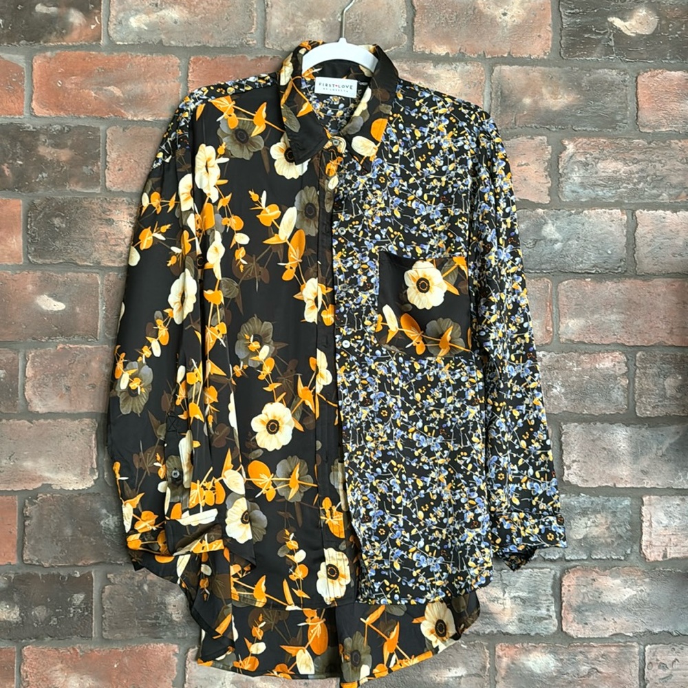 Tunic length blouse. Beautiful satin like fabric.  Size Medium. New without Tags